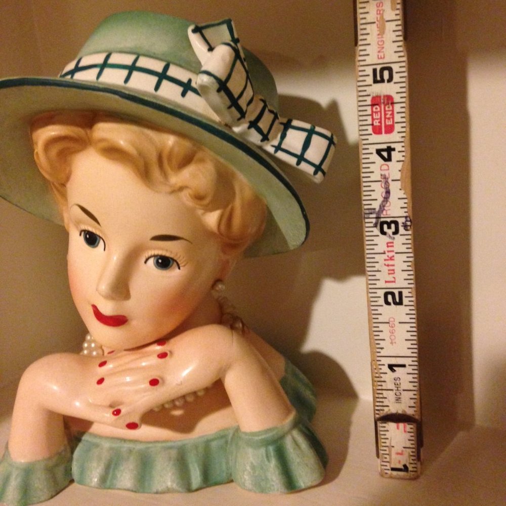 Head Vase with green hat and checkered bow